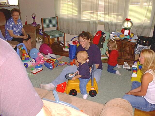 Here is Elijah riding his new dump truck from his Grampa Doug and Diane.