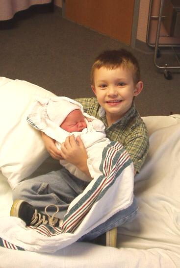 Timothy holding his little Mary.
