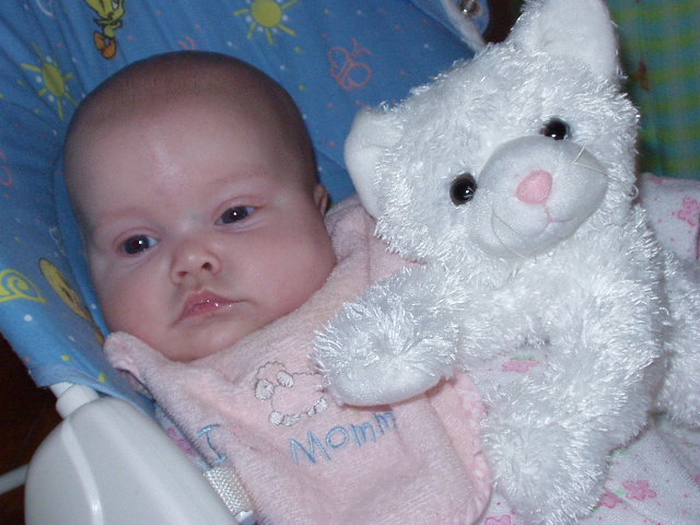 Mary with her kitty that she received from the Easter bunny :)