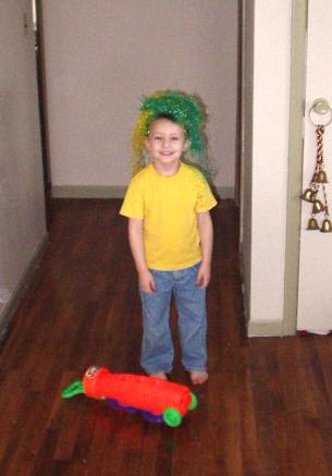 Timothy found a use for the easter grass (that is ALL over the house)!
