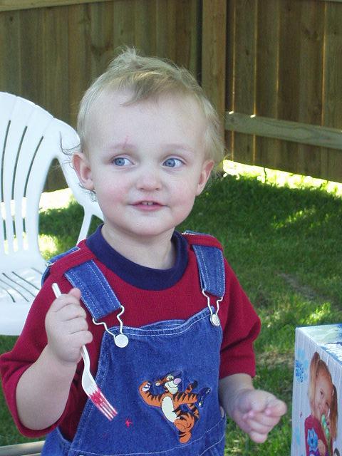 Look at those blue eyes and the soon to be red face.