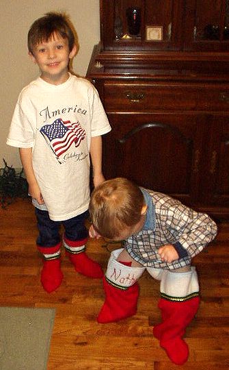 The boys had fun wearing the Christmas stockings. Elijah decided to dance with them on!