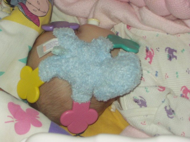 Abby fell asleep with this toy on her head! It was so cute :)