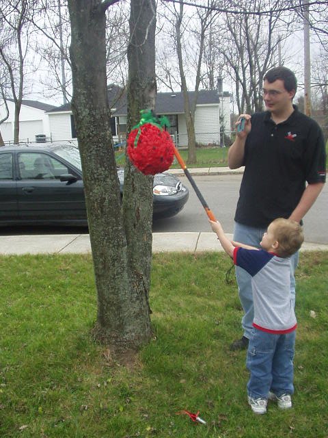 Elijah is a pro when it comes to breaking open a piñata.