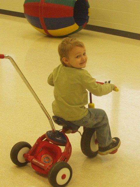 I can ride a bike!! (with 3 wheels :))