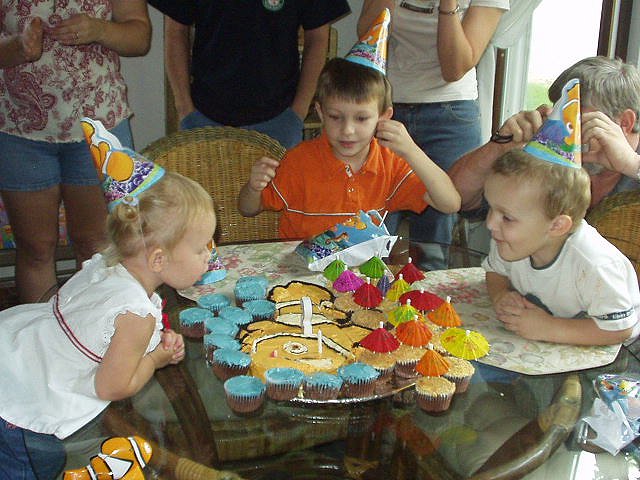 Caitlyn blew out her candle and Elijah blew out my candle on the cake.