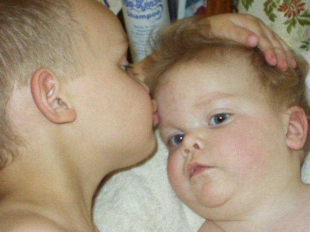 Look at those cute little lips pressed up against Marys head :)(: sweet!