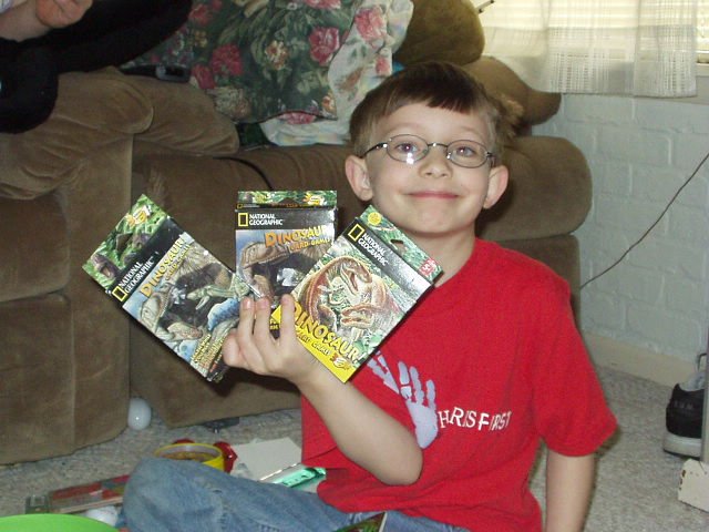 I have three packs of Dino cards!!!