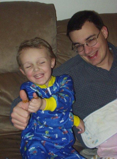 Elijah and Daddy both have a tiger band-aid. 