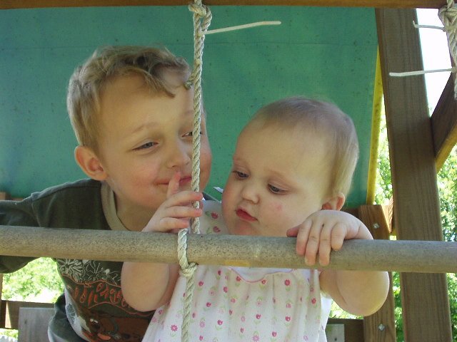 Elijah is going to give Abigail a kiss. I am not going to be able to keep Abigail off of the fort!