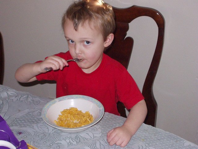 Elijah is eating!!!! and it didn't come in a blue or green bag!!!!