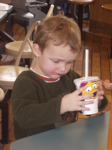 Elijah is drinking his day away :) (sprite of course)