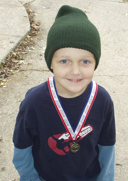 Elijah received a medal in Gymnastics!!!! Good Job Elijah!!