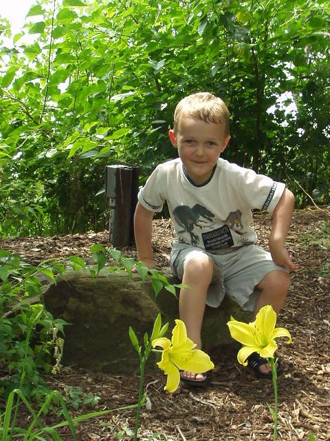 If you think that he is sitting on a rock off of the trail...umm...you are...umm... wrong?? :)