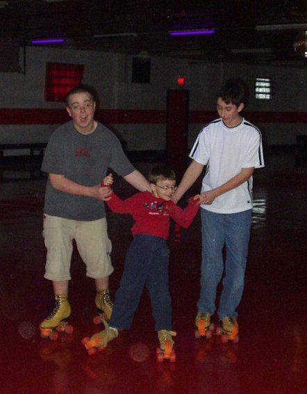 Timothy is getting a little help from Chris and a friend!