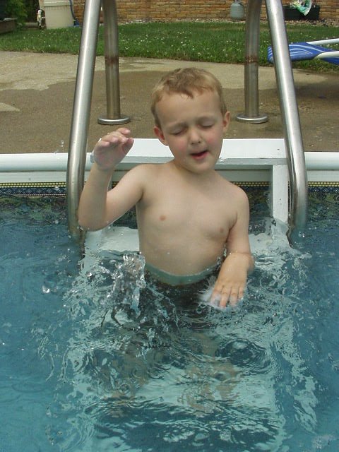 I think Elijah needs to be IN the water in order to swim!