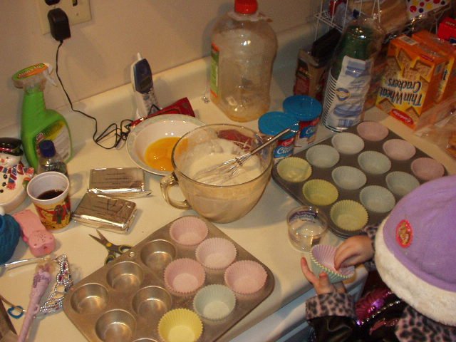 Abigail counted out the baking cups she needed for cupcakes!
