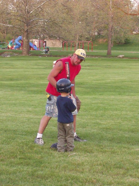 My coach is helping me with the bat :)