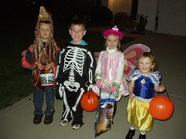 Elijah found one of his friends while we were out begging for candy!! \