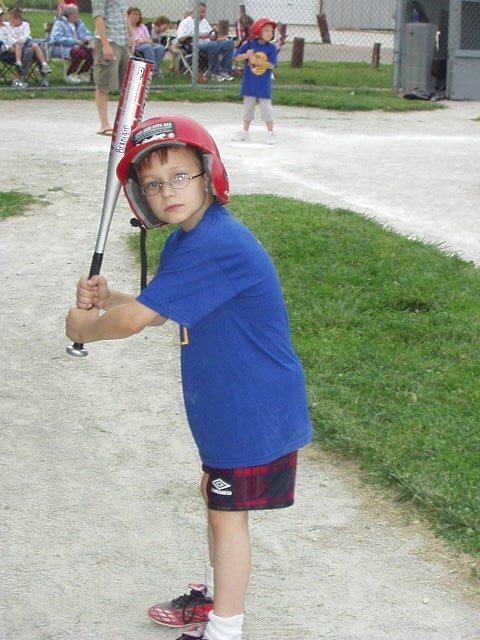 Timothy looks so serious in this picture. He does really well in baseball :)