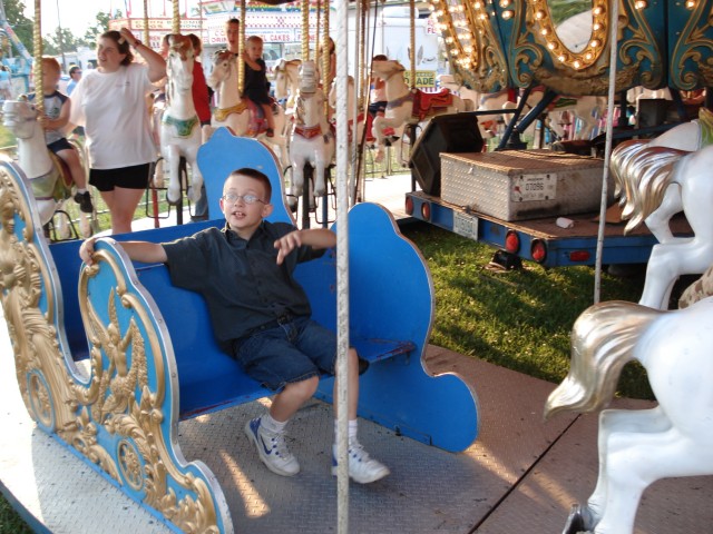 I think Timmy is too big to ride the ponies.