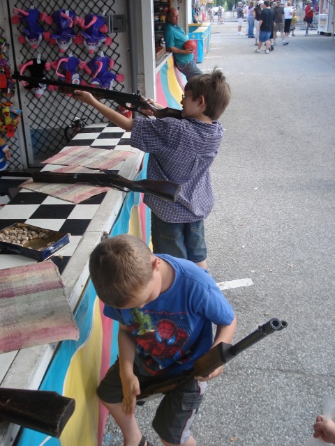 Elijah was going to field strip the rifle and clean it first, but apparently the carnival guy want him to just cock it.