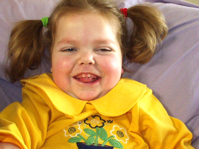 Big smiles from the piggy-tail girl :)