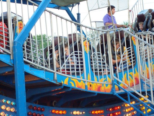 Elijah actually decided to ride the Balls of Fire thing!  He's braver than I am.
