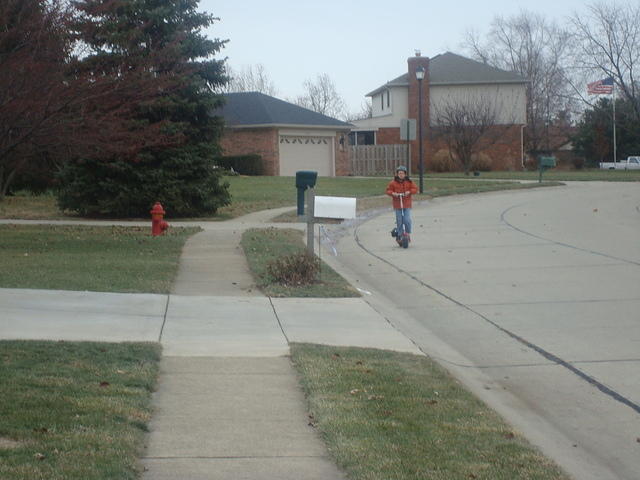 There he is!  Happy birthday Tim.  I hope you enjoy your Go-ped! :)