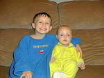 Timothy and Elijah are wearing Daddy's old clothes.