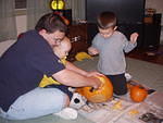 Daddy is lending a helping hand.