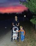 I thought the sky looked pretty and Timothy was looking for the next house.