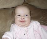 She almost looks like she is trying to wink \