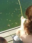 Don't you like how Elijah is helping reel the fish in? He did help start the reeling process :)