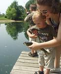 Elijah was worried about falling in..I think the fish was worried about breathing :)