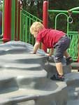 Elijah pretending to be spider-man.
