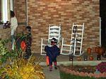 Timothy really blends in with the brick wall :) hehe  Elijah wanted to blow the candles out.