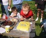Elijah blowing out his candles.