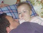 Doesn't Daddy look cute sleeping next to me?