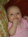 Abigail thinks she is funny because she can fit all of her fingers in her mouth :O