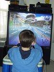 Timothy was having fun playing a driving game. He plays these games better than I do.