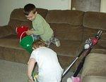 Timothy was on the move collecting eggs...Elijah was having fun looking in his basket.