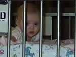 Hey, are you guys going to let me out?? (it's actually Mary's bed)