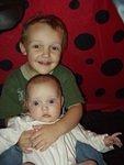 Abigail and Elijah spend some time together in the lady bug tent.