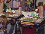 Timothy was trying to act 'cool' around his friends. So, he decided to hide under his desk?? :)