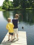 Timothy caught the first fish of the day!!! (check out the pole)