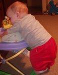 Abigail is trying to reach her cookie :)