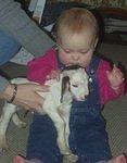 Mamaw is helping Abigail hold Daisy :)