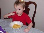 Elijah is eating!!!! and it didn't come in a blue or green bag!!!!