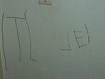 So since Mary wrote on Elijah's head....he told me that she also WROTE HIS NAME ON THE WALL!!!! (soI need to let Mary know how to spell ELI!!)